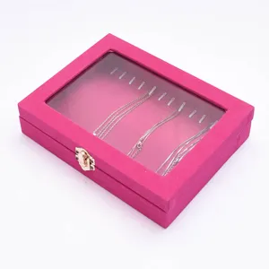Roze fluwelen sieradendoos met doorzichtig deksel voor opslag van kettingen en armbanden