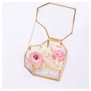 Heart-shaped glass jewelry box with brass edge, clear retro storage container and decor.