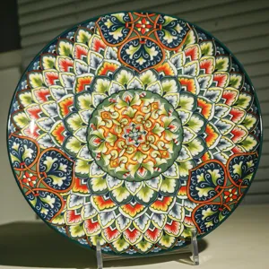 Detailed view of the bohemian ceramic dinner plate with colorful mandala pattern.