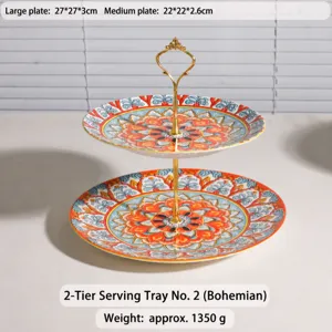 Frutero y soporte para postres de cerámica de dos niveles con patrones bohemios coloridos.