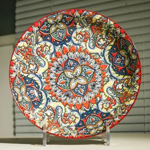 Detailed view of an 8-inch ceramic dinner plate featuring vibrant bohemian and Mediterranean majolica patterns.