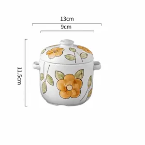 Ceramic stew pot with lid, floral pattern, 450ml capacity for kitchen cooking and dessert.