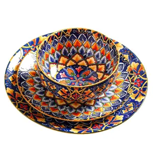 Bohemian style ceramic dinnerware set, vibrant floral pattern plates and bowls for dining.