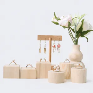 Solid wood jewelry display stand set, including square and round ring holders for stores.