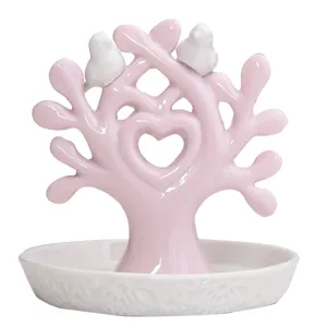 Ceramic tree jewelry display stand with cute little birds and white storage tray for home decor.