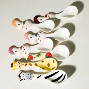 Ceramic spoon set featuring cute animal and cartoon designs for dessert and coffee use.