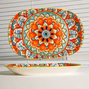 Bohemian ceramic oval fish plate with vibrant mandala floral pattern, microwave safe dish.