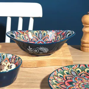 Blue bohemian ceramic bowl set with intricate mandala patterns, elegant kitchen tableware.