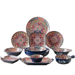 Blue bohemian ceramic dinnerware set, mandala pattern bowls and plates for home kitchen use.