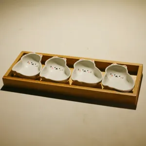 Cute cat ceramic sauce dish set with 3-grid bamboo tray for snacks and desserts.