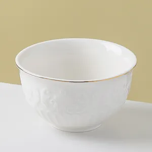 Gold rim embossed ceramic rice bowl elegant soup bowl vintage tableware detail shot