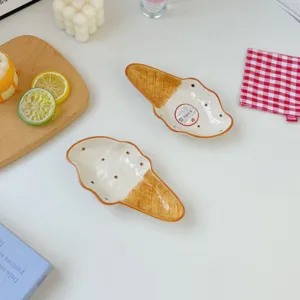 Creative ceramic ice cream shaped dessert plate set, hand-painted embossed tableware detail shot.