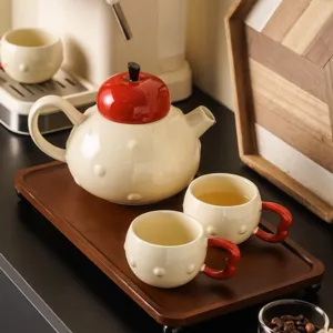 Creative apple shape ceramic tea set with teapot, two cups and wooden tray for gift