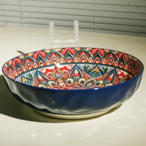 Large 10-inch Bohemian ceramic soup and fruit bowl with colorful underglaze geometric patterns.