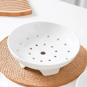 White ceramic steaming plate with multi holes and high feet for kitchen food cooking main image