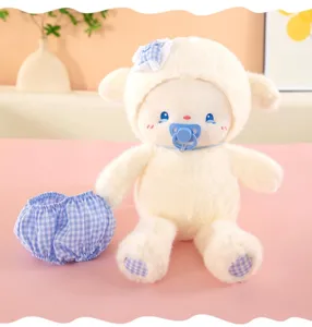 Cute plush sheep toy with pacifier and blue checkered shorts, soft soothing doll.