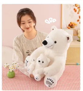 Cute polar bear plush toy detail shot, soft mother and baby stuffed animal for kids decor.