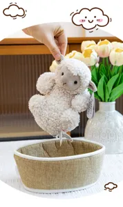 Detailed view of cute curly lamb plush toy close up showing soft texture and sweet face.
