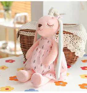 Cute pink lop-eared bunny plush toy, soft stuffed animal doll, perfect kids soothing gift.