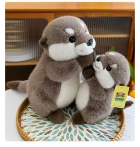 Cute simulation otter plush toy pair with magnetic hands, soft stuffed animal doll gift for kids.