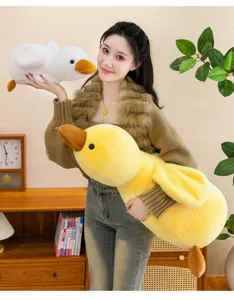 Cute yellow plush duck soft stuffed toy pillow, comfortable hugging doll for kids and home.