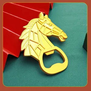 Detail showing the gold metal horse head bottle opener with textured red background