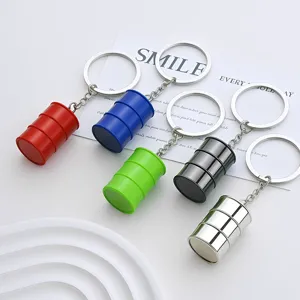 Creative oil barrel keychains in multiple colors with metallic finish, ideal corporate gifts