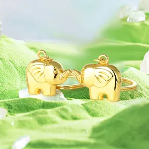 Pareja de llaveros de elefante dorado para parejas, recuerdo creativo de metal.