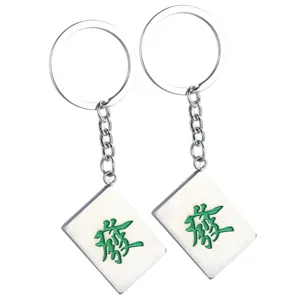 Creative Mahjong keychain with green Fa character on white tile for luck