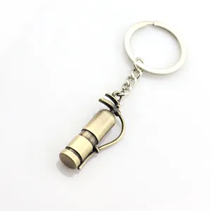 Mini metal fire extinguisher keychain in vintage bronze finish for safety promotion