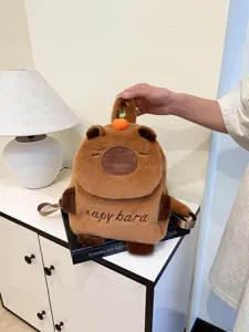 Cute capybara plush backpack for kids, soft brown animal daypack with handle and straps.