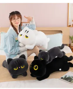 Cute sleeping cat plush toy detail, soft stuffed animal pillow for kids bedroom room decor.