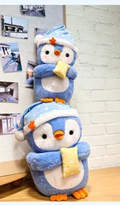 Cute blue plush penguin stuffed animal toy with sleep cap and star pillow for kids gifts.