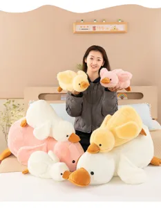 Cute plush duck toy pillow, soft stuffed animal doll for kids and girls birthday gifts.