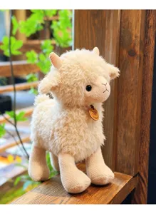 Cute plush lamb toy with soft white fleece and small horns, ideal children birthday gift!