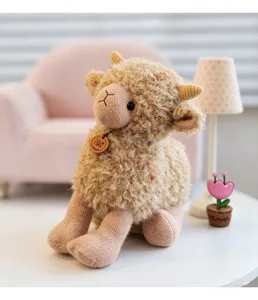 Detailed view of the cute plush sheep toy with knitted limbs and lovely horns on white table.