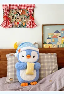 Cute sleeping penguin plush toy with nightcap and pillow, soft stuffed animal gift for kids.