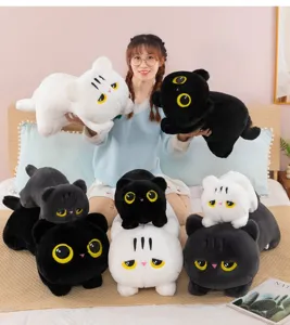 Cute black and white cat plush toys scene display, soft sleeping pillow doll for kids and home.