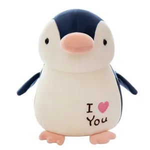Cute penguin plush toy doll with heart embroidery, soft stuffed animal pillow for kids and girls.