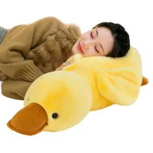 Cute yellow duck plush pillow and soft stuffed doll for sleeping, comfortable kids gift.