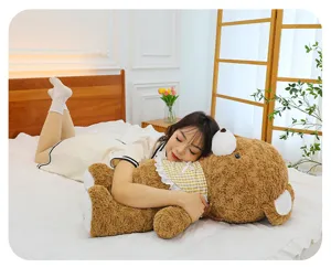 Cute brown plush teddy bear pillow with plaid bib, soft stuffed animal toy for girls sleep.