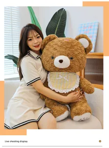 Cute mocha brown teddy bear plush toy with check bib, soft stuffed doll gift for kids.