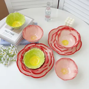 Detailed view of handmade flower ceramic bowl and plate set, exquisite petal texture.