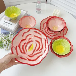 Hand painted ceramic rose flower plate and bowl set, artistic floral tableware for dining.