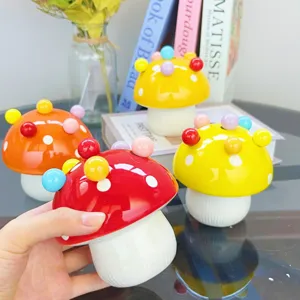 Cute ceramic mushroom storage jar set with colorful beads, perfect for fruit forks and dessert storage.