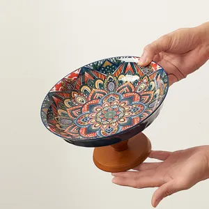Frutthiera in ceramica con piedino in stile bohemien per tavolino da caffe e dessert.