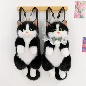 Cute black white cat plush backpack for young girls, soft schoolbag and lovely gift.