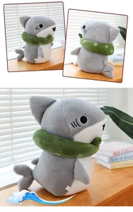 Cute shark plush toy detail view, soft stuffed animal doll with green neck pillow for home decor.