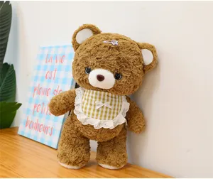 Brown curly plush teddy bear toy with cute plaid bib and hair clip for kids gift.