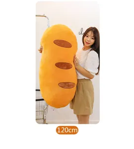 Gedetailleerd overzicht van het 120 cm grote baguette pluche kussen binnen getoond.
